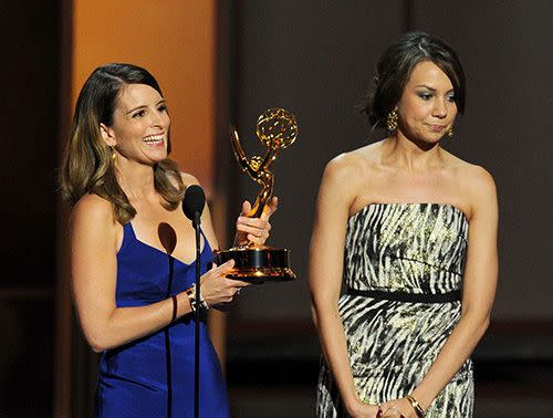 Fey (L) and Wigfield during their acceptance speech at the Emmys. Credit: Getty Images