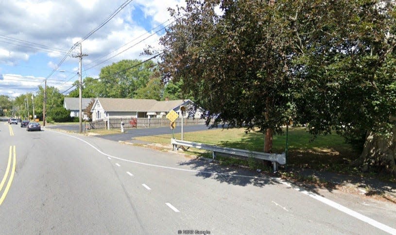 A guard rail extension is being urged by the property owners of J. Renee Hair Studio and Patti's Place Hair Design to prevent cars from crashing onto their properties. (Credit Google Earth)