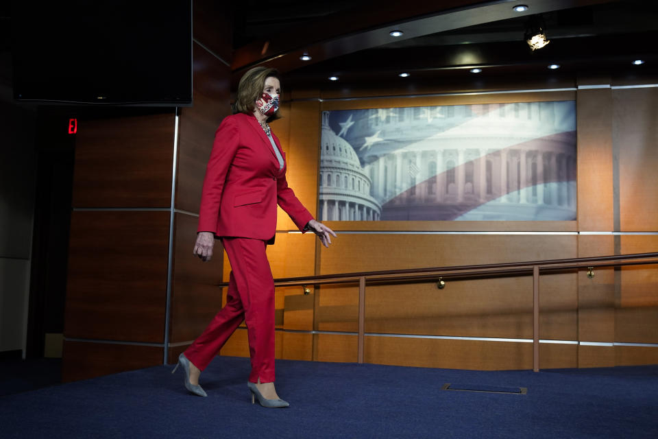 House Speaker Nancy Pelosi of Calif., arrives to speak to the media, Wednesday Dec. 30, 2020, on Capitol Hill in Washington. (AP Photo/Jacquelyn Martin)