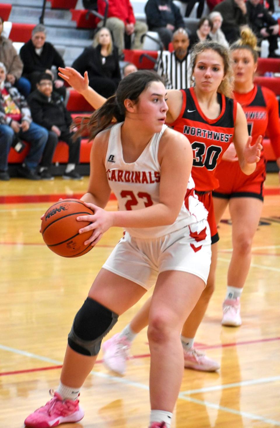 Coldwater's Elli Foley looks for an open teammate Tuesday night versus Northwest.