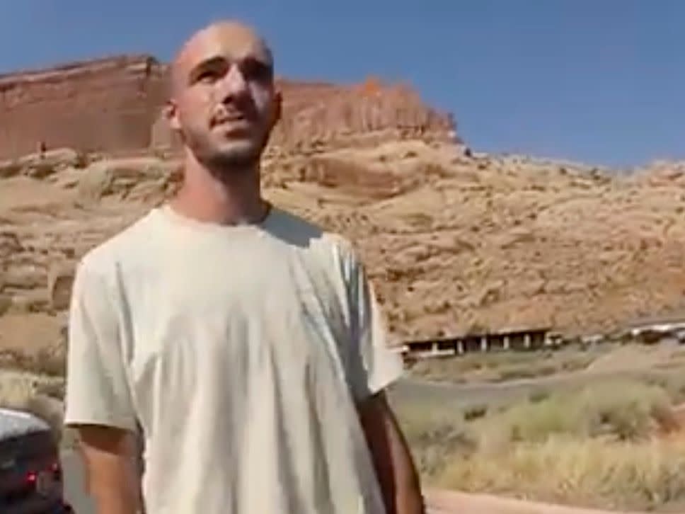 This Aug. 12, 2021 file photo from video provided by The Moab Police Department shows Brian Laundrie talking to a police officer after police pulled over the van he was traveling in with Gabby Petito, near the entrance to Arches National Park. 