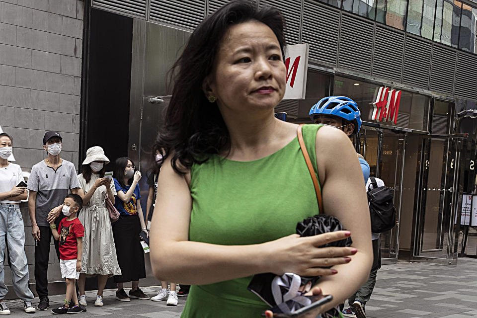 FILE - Cheng Lei, a Chinese-born Australian journalist for CGTN, the English-language channel of China Central Television, attends a public event in Beijing on Aug. 12, 2020. The Australian partner of the journalist who has been detained in China for nearly two years said Thursday, June 2, 2022, she is being denied the chance to speak with her family and consular staff, and her health is declining due to a poor prison diet.(AP Photo/Ng Han Guan, File)