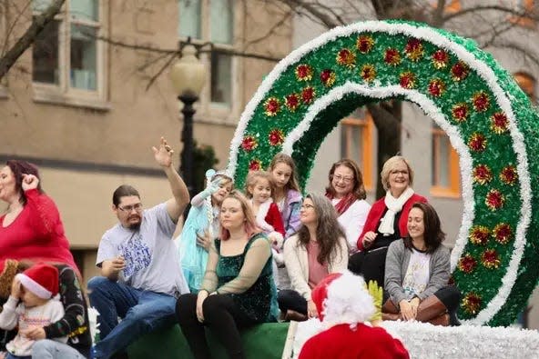 The Gate Beautiful float makes its way in the 2021 Rotary Christmas Parade in Fayetteville. Organizers say safety precautions are in place for this year's parade.