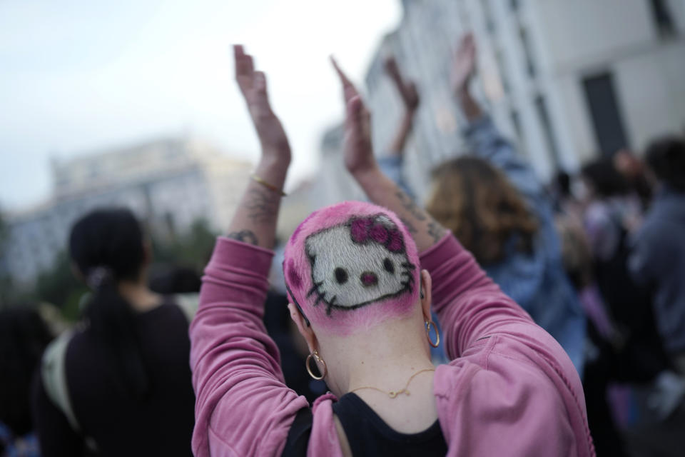 Demonstrators clap their hands during a march to celebrate International Transgender Day of Visibility in Lisbon, Friday, March 31, 2023. (AP Photo/Armando Franca)