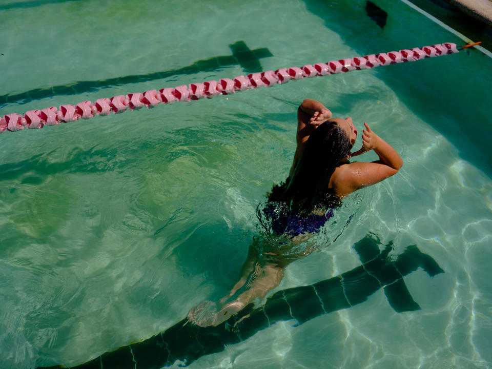 Maya, 11, swims in Houston. State law prohibits Maya from playing girls’ sports in school, but she swims on a private team. It’s not the first time being trans has prevented her from competing—she quit gymnastics years ago because she didn’t want to risk disqualifying her teammates. The experience made her “mad and sad,” she says. But she finds swimming on her new team “really fun and relaxing.”<span class="copyright">Annie Flanagan for TIME</span>