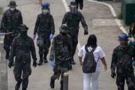 Philippine capital on stricter lockdown amid coronavirus infections spike