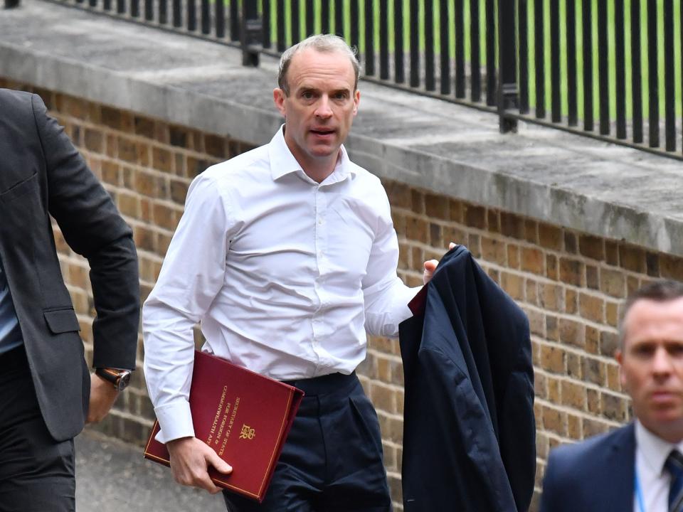 Raab is pictured arriving at Downing Street (AFP via Getty Images)