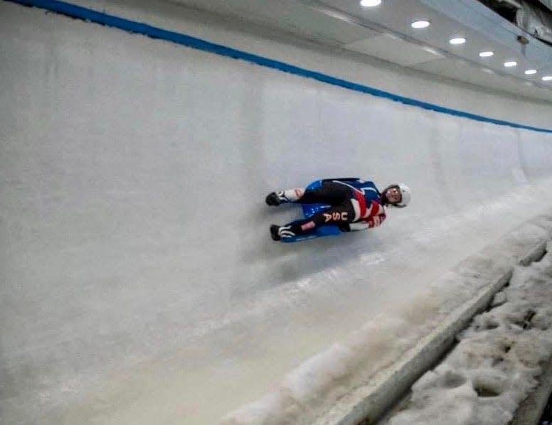 Adeline Albert slides down the track in the luge. The Thomas Worthington sophomore suffered a traumatic brain injury in February in a luge training accident in South Korea.