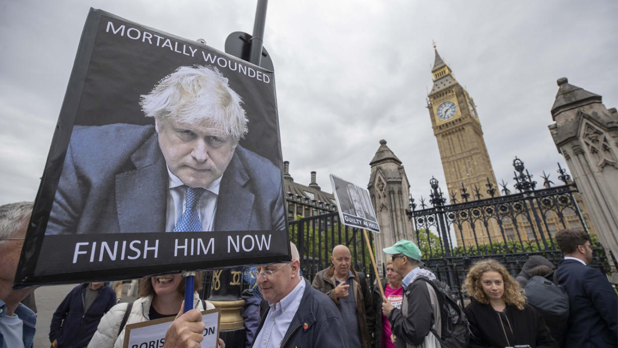 Protests are held in front of the Parliament building during a no-confidence vote for British Prime Minister Boris Johnson. 