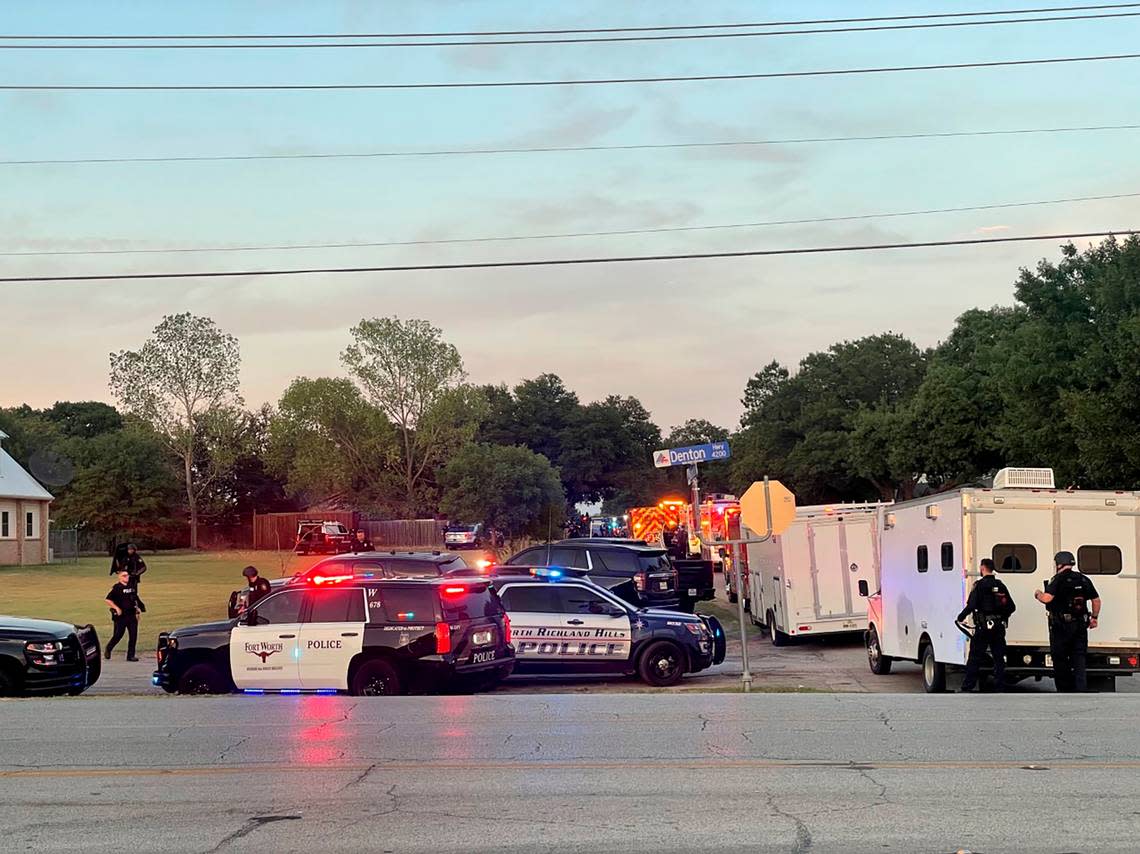 Law enforcement work the scene where multiple shots were fired near the area of Diamond Oaks Drive in Haltom City, Texas, Saturday, July 2, 2022.