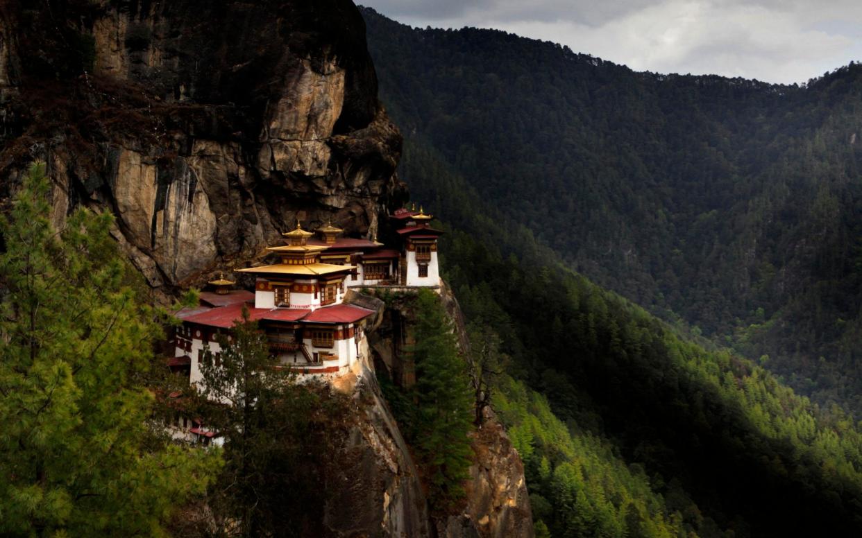 Visitors come for Bhutan's spectacular sights such as the Tiger's Nest Monastery - AP