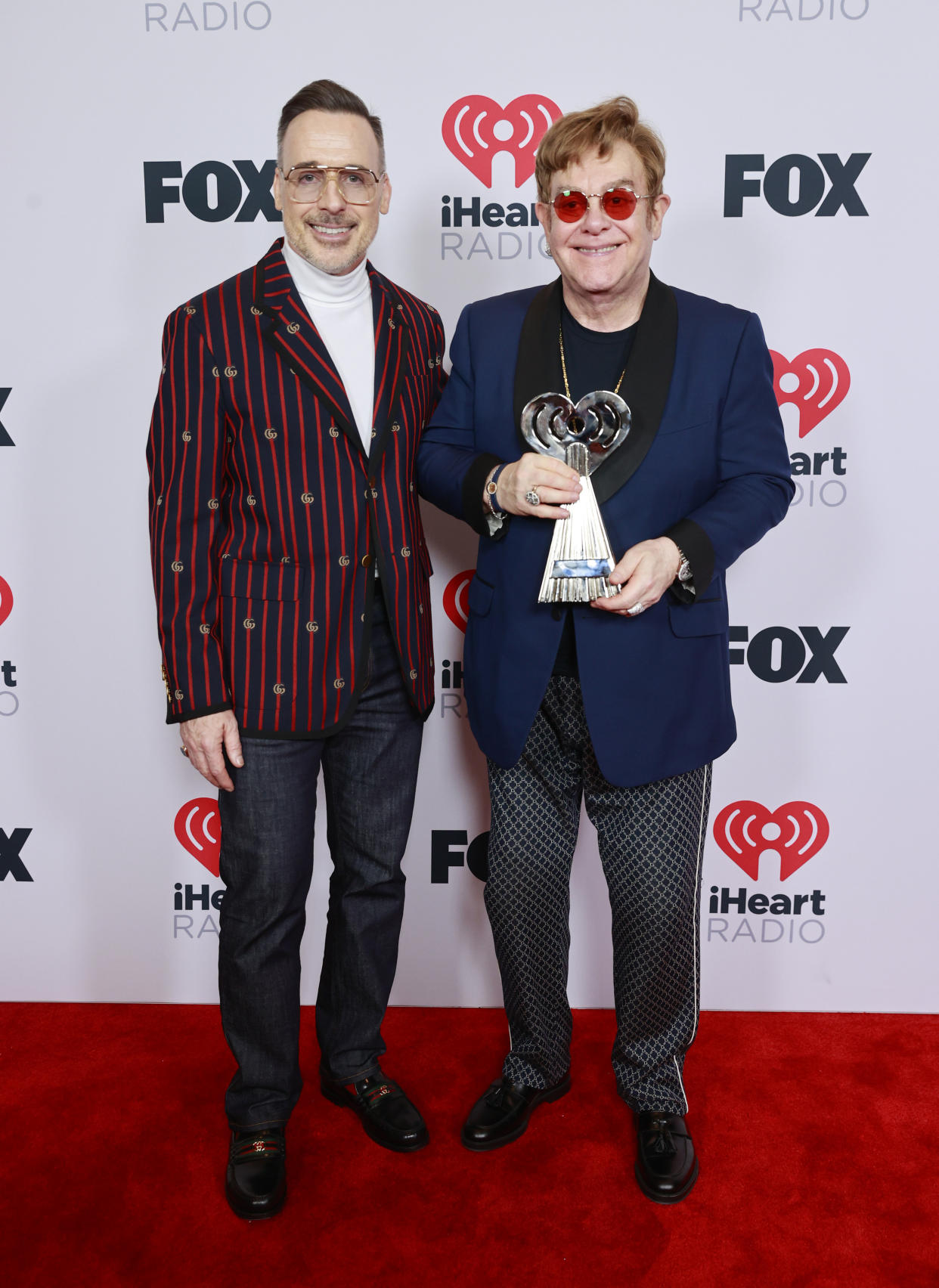 Sir Elton John and David Furnish married in 2014. (Photo by Emma McIntyre/Getty Images for iHeartMedia)