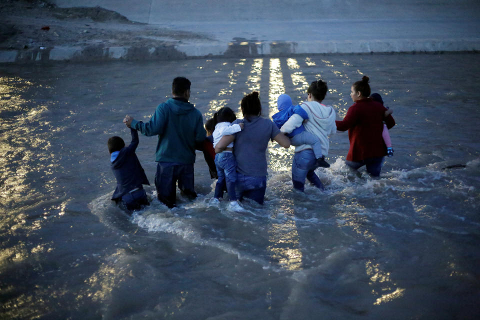 Migrants from Central America cross the Rio Bravo river to enter illegally into the United States to turn themselves in to request for asylum in El Paso, Texas, U.S., as seen from Ciudad Juarez, Mexico June 11, 2019. Picture taken June 11, 2019. REUTERS/Jose Luis Gonzalez