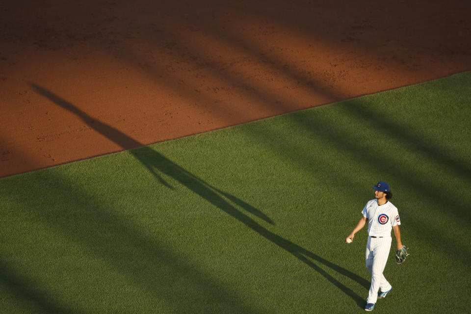 Chicago Cubs starting pitcher Yu Darvish walks around the mound after a strikeout during the third inning of a baseball game against the Milwaukee Brewers, Thursday, Aug. 13, 2020, in Chicago. (AP Photo/Jeff Haynes)