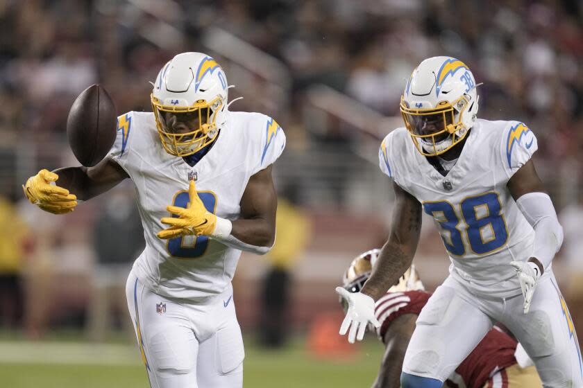 Los Angeles Chargers linebacker Daiyan Henley (0) intercepts a pass.