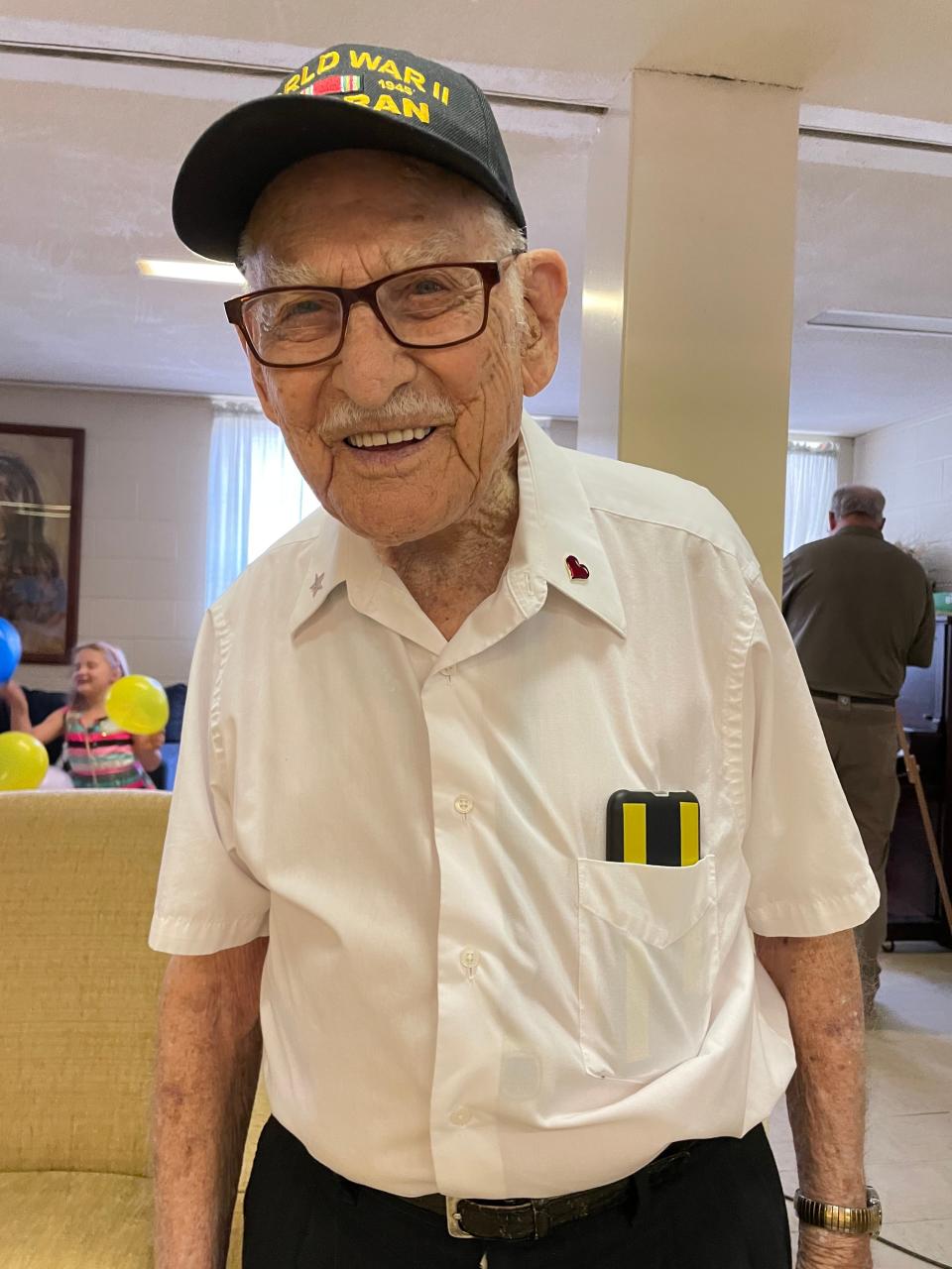 World War II veteran John Leonard Hodges celebrates his 100th birthday with family and friends at Marquis Memorial United Methodist Church in Staunton, Va.