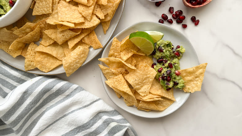 plate with chips and guacamole