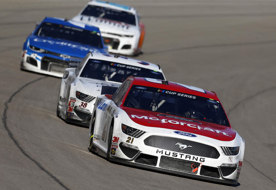 Matt DiBenedetto (in the #21 Motorcraft/Quick Lane Ford) races at the NASCAR Cup Series Pennzoil 400 at Las Vegas Motor Speedway. (Photo by Jonathan Ferrey/Getty Images)