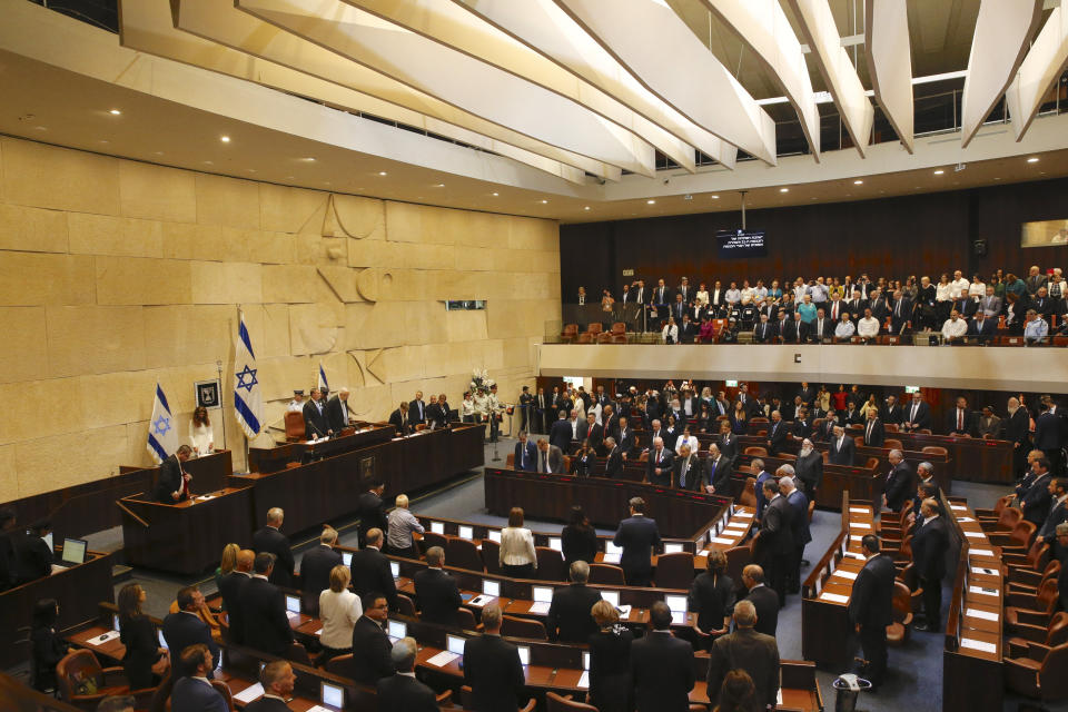 The general view of the plenum during the swearing in ceremony at the Caesar Premier Jerusalem in Jerusalem, Tuesday, April 30, 2019. Members of Israel's parliament are being sworn in at the Knesset, the country's legislature, three weeks after a tumultuous national election.(AP Photo/Ariel Schalit)