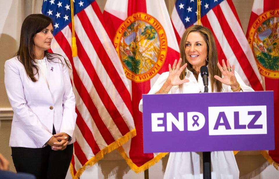 Florida Lt. Gov. Jeanette Nuñez, left, listens as Department of Elder Affairs Secretary Michelle Branham, right, speaks on Wednesday during a gathering at the Elliott Center at Hospice of Marion County in Ocala.