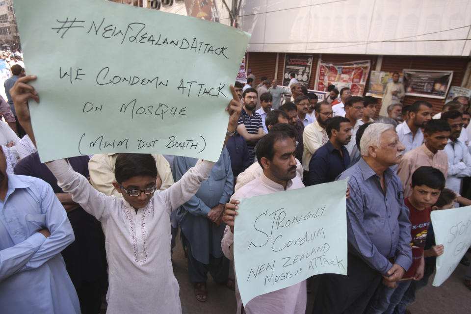 Pakistanis protest to condemn the New Zealand mosque shooting, in Karachi, Pakistan, Friday, March 15, 2019. Pakistan's prime minister Imran Khan has condemned attacks on two mosques in New Zealand, saying he blames rising "Islamophobia." Khan wrote Friday on Twitter that "terrorism does not have a religion." (AP Photo/Fareed Khan)