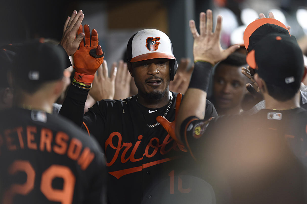 The Baltimore Orioles’ Adam Jones is putting his money to good use. (AP Photo)