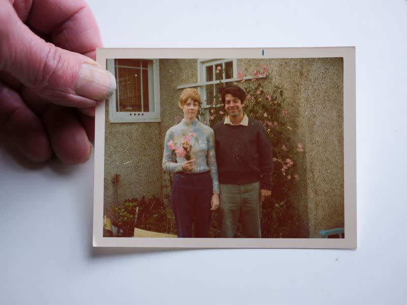 FILE PHOTO: Howard Smith shows a photograph of he and his wife, Lois, who he has not been able to visit at the New Paltz Center nursing facility in two weeks due to lockdowns caused by the outbreak of coronavirus disease (COVID-19) in Pine Bush