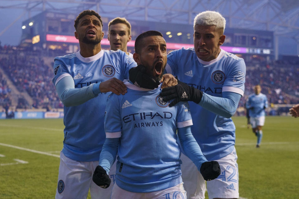 New York City FC's Maximiliano Moralez, center, celebrates his goal with teammates during the second half of an MLS playoff soccer match against the Philadelphia Union, Sunday, Dec. 5, 2021, in Chester, Pa. (AP Photo/Chris Szagola)