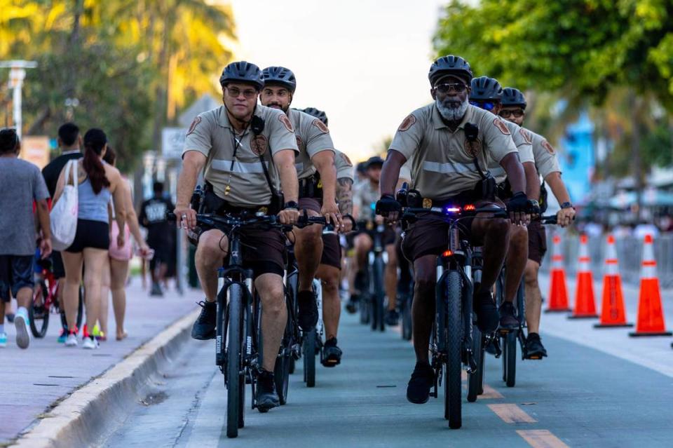 Miami-Dade Bike Patrol pedals up Ocean Drive during Memorial Day weekend at Miami Beach, Florida, on Sunday, May 28, 2023.