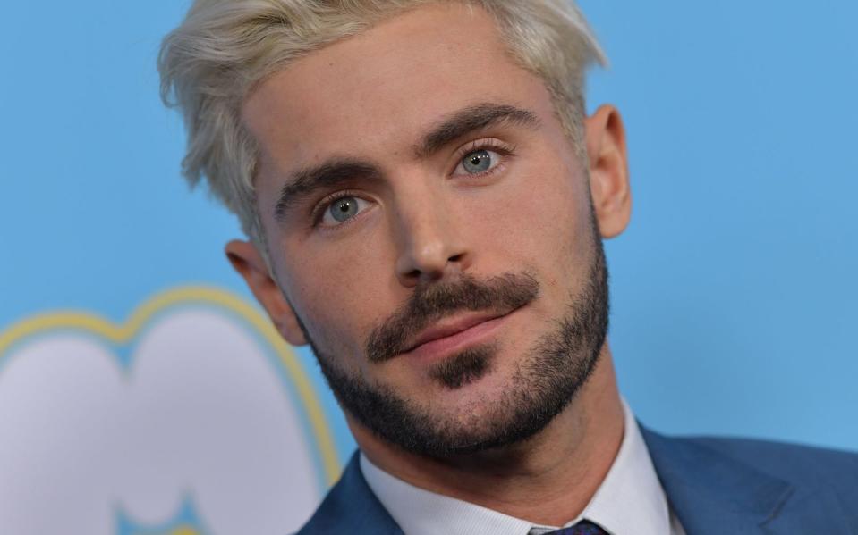 <p>Bei einem so hübschen Kerl wenig überraschend: Auch jenseits der Teenager-Zeit kam Zac Efron, inzwischen 34, noch zu einigen großen Filmrollen, etwa in "Baywatch" und den beiden "Bad Neighbours"-Filmen. (Bild: Chris Delmas/AFP/Getty Images)</p> 