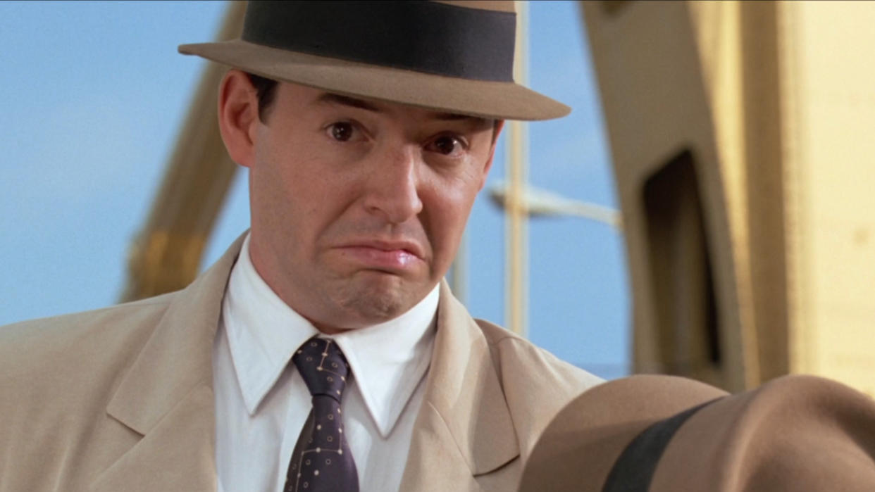  Matthew Broderick making a face of discomfort in Inspector Gadget. 