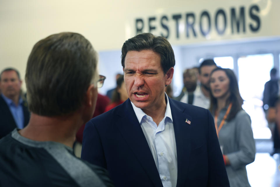 Florida Gov. Ron DeSantis greets guests.