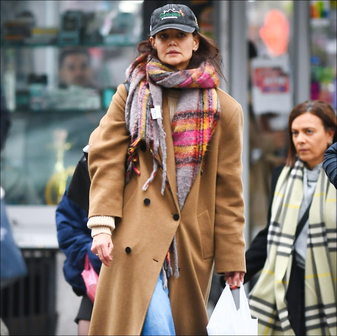  Katie Holmes in a Camel Coat, colorful plaid scarf, jeans. 