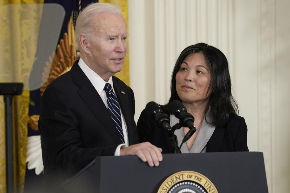 FILE - President Joe Biden talks about his nomination of Julie Su, right, to serve as the Secretary of Labor during an event in the East Room of the White House in Washington, Wednesday, March 1, 2023. Su, will testify to the Senate Thursday with key Democrats unwilling to voice support for her confirmation, creating uncertainty about her prospects in the narrowly-divided Senate. (AP Photo/Susan Walsh, File)