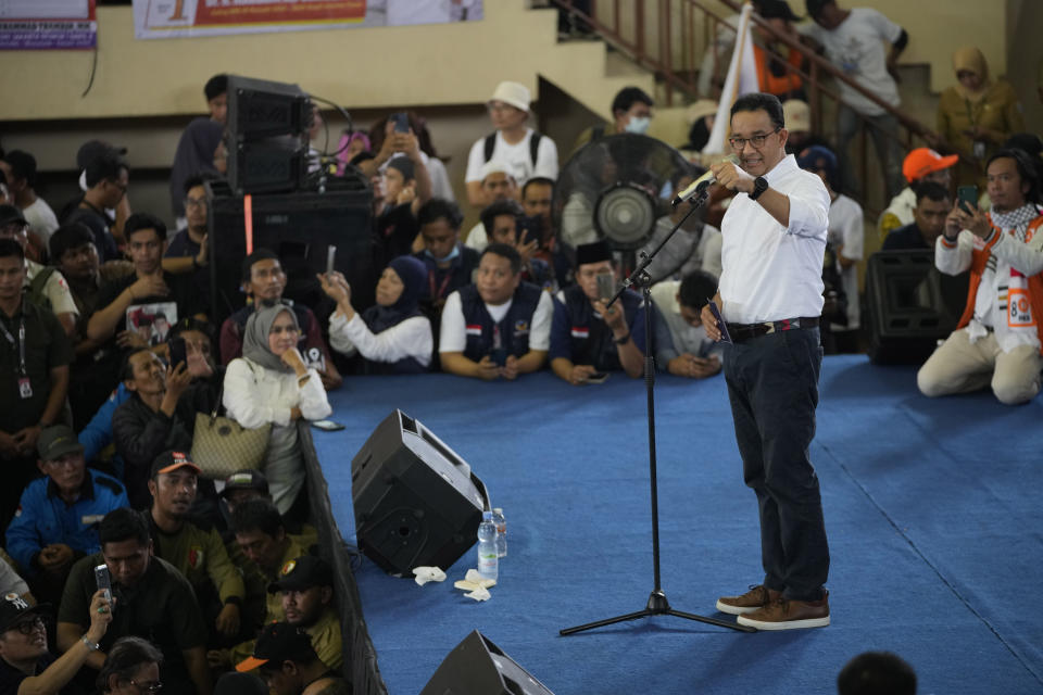 Presidential candidate Anies Baswedan gestures as he delivers a speech during his campaign rally in Jakarta, Indonesia, Tuesday, Nov. 28, 2023. Candidates officially began their campaign for next year's election which will determine who will succeed President Joko Widodo who is now serving his second and final term. (AP Photo/Achmad Ibrahim)