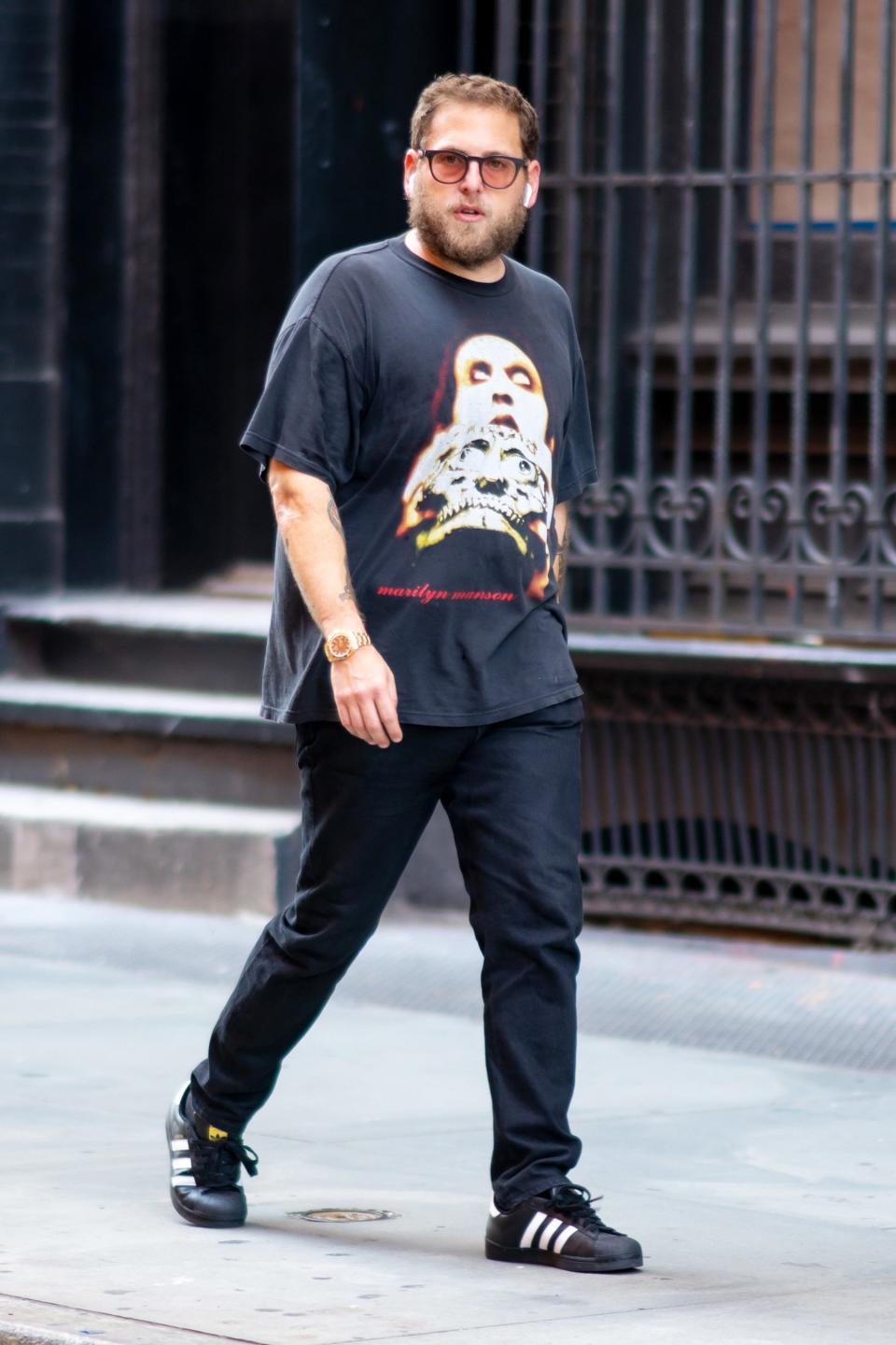 Jonah Hill steps out in N.Y.C.’s SoHo neighborhood on Wednesday dressed in all black with rose-colored sunglasses.