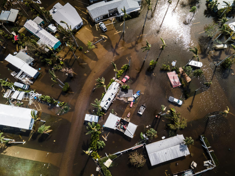 Flooding is seen in Fort Myers, Fla., on Sept. 29, 2022, the day after Hurricane Ian hit land.<span class="copyright">Christopher Morris for TIME</span>