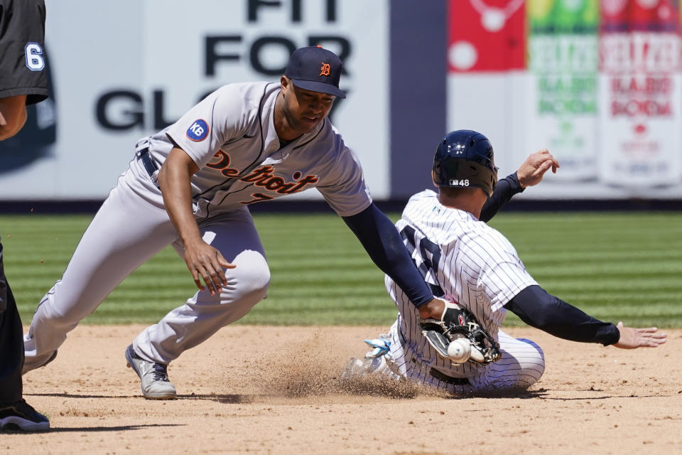 New York Yankees' Josh Donaldson, right, steals second base past Detroit Tigers second baseman Jonathan Schoop in the eighth inning of a baseball game, Sunday, June 5, 2022, in New York. (AP Photo/Mary Altaffer)