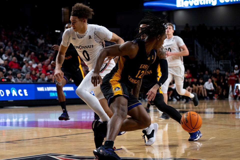 East Carolina Pirates guard Javon Small (12) steals the ball in their last game at Cincinnati Jan. 11.