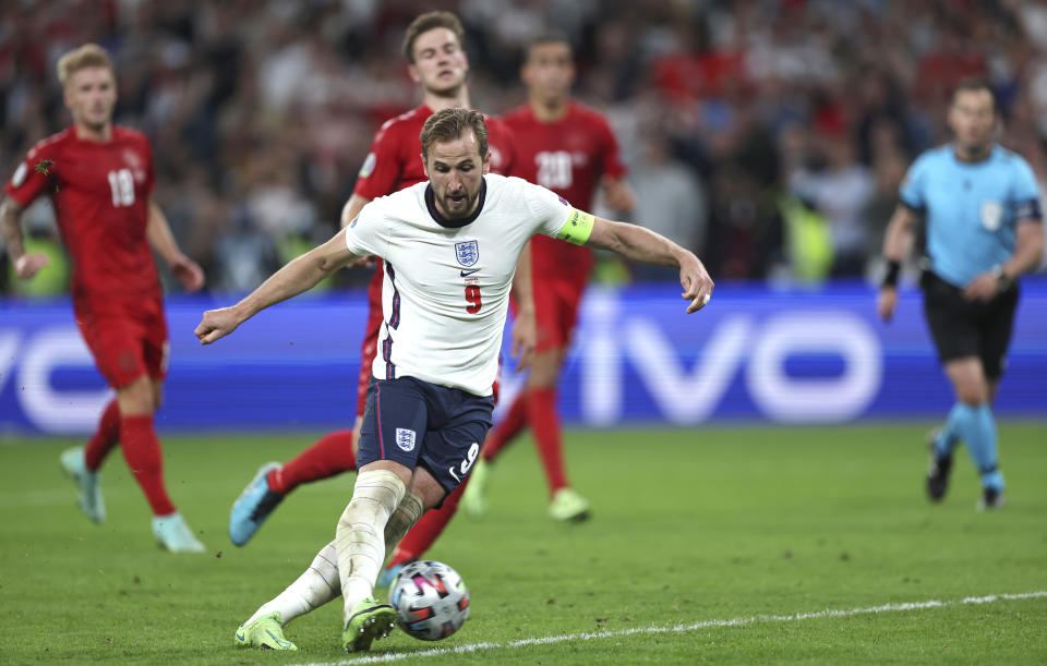 LONDON, ENGLAND - JULY 07: Harry Kane of England scores from the rebound of a missed penalty for their team's second goal during the UEFA Euro 2020 Championship Semi-final match between England and Denmark at Wembley Stadium on July 07, 2021 in London, England. (Photo by Eddie Keogh - The FA/The FA via Getty Images)