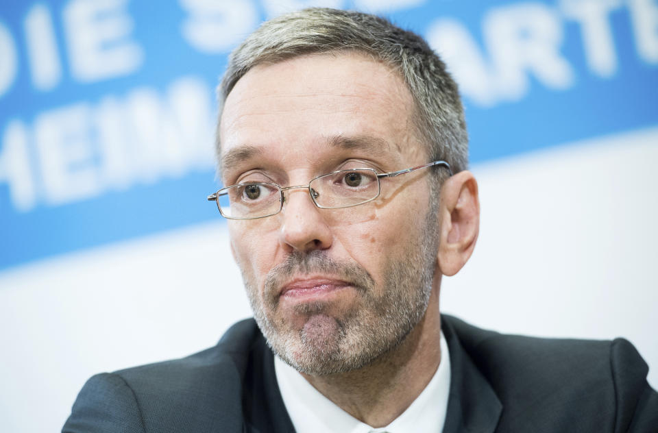 Austrian Minister of the Interior Herbert Kickl, of the right-wing Freedom Party, FPOE, addresses the media during a news conference with designated party leader and Austrian Transport Minister Norbert Hofer in Vienna, Austria, Monday, May 20, 2019. Austrian Chancellor Sebastian Kurz has called for an early election after the resignation of his vice chancellor Heinz-Christian Strache from the Freedom Party spelled an end to his governing coalition. (AP Photo/Michael Gruber)