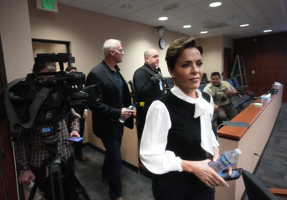 Kari Lake walks into the courtroom for her Maricopa County Superior Court hearing in Mesa on Thursday, Dec. 22, 2022. 