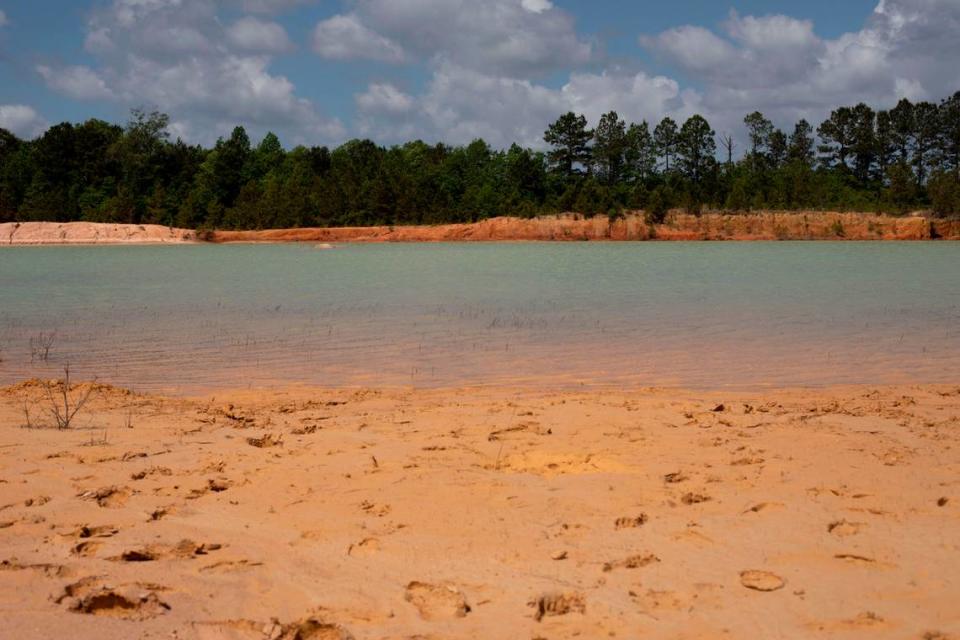 Footprints in the clay at a now-defunct dirt pit in Hancock County lead to a clear pond with a mud embankment in the middle. Aydin Stallings, 18, of Kiln, drowned on Sunday, April 24, 2022, while swimming in the ponds with friends.