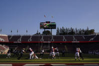 Stanford quarterback Davis Mills (15) passes against Colorado in front of empty seats at Stanford Stadium during the second half of an NCAA college football game in Stanford, Calif., Saturday, Nov. 14, 2020. (AP Photo/Jeff Chiu)