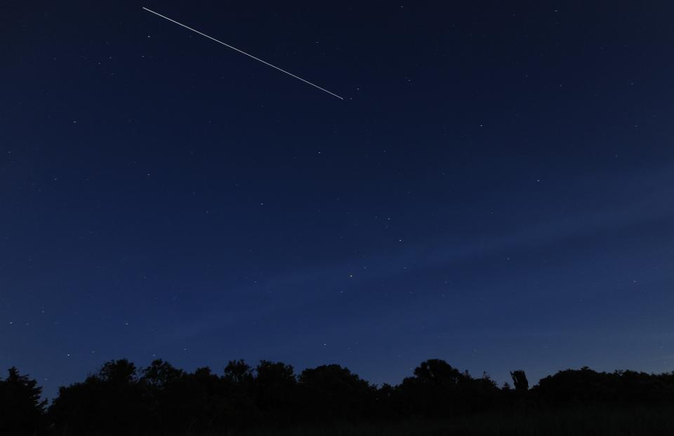 The International Space Station cuts through the night sky over Barnstable, Massachusetts on July 15, 2020. (Merrily Cassidy/Cape Cod Times)