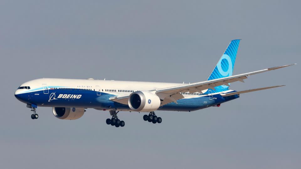 A Boeing 777-X performing a flight demonstration at the Dubai Airshow. - Giuseppe Cacace/AFP via Getty Images