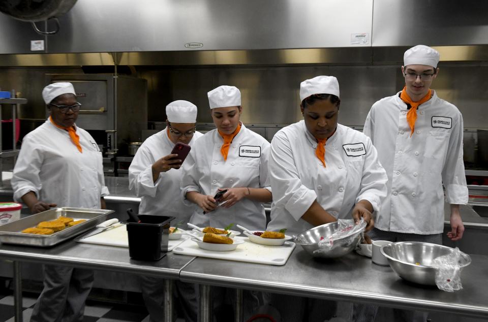 Currents students in the culinary skill program Marie Nadie Pierre Fa, left, Lawanda Brooks, Domihanna Peralta, Ayrias Siggers and Matthew Lewis Wednesday, Nov. 30, 2022, at the Wor-Wic Community College in Salisbury, Maryland. 