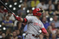 Cincinnati Reds' Joey Votto watches his two-run home run during the seventh inning of a baseball game against the Milwaukee Brewers, Monday, June 14, 2021, in Milwaukee. (AP Photo/Aaron Gash)