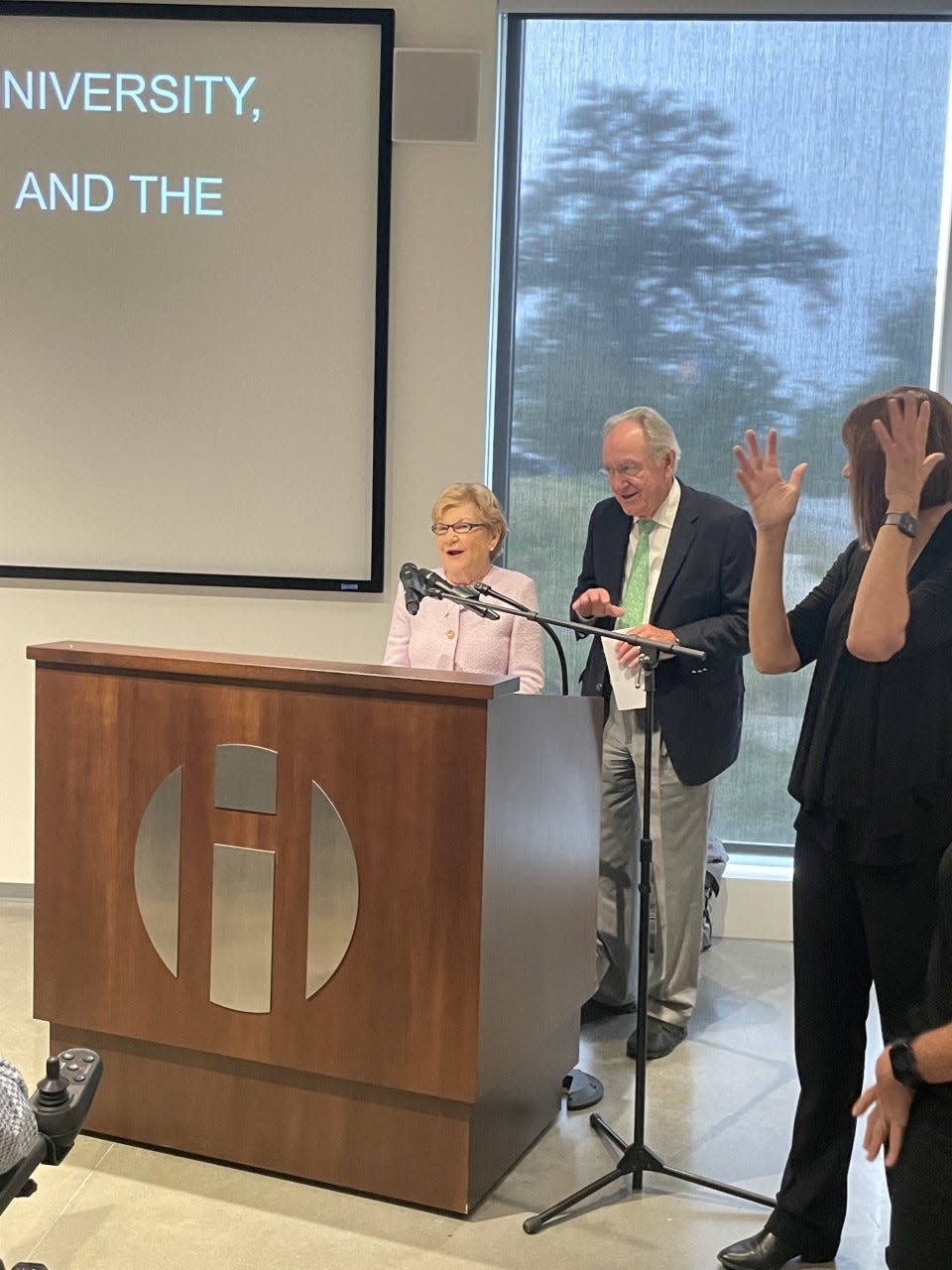 Ruth Harkin (left) speaks at the dedication ceremony for the Tom and Ruth Harkin Center at Drake University on Aug. 20.