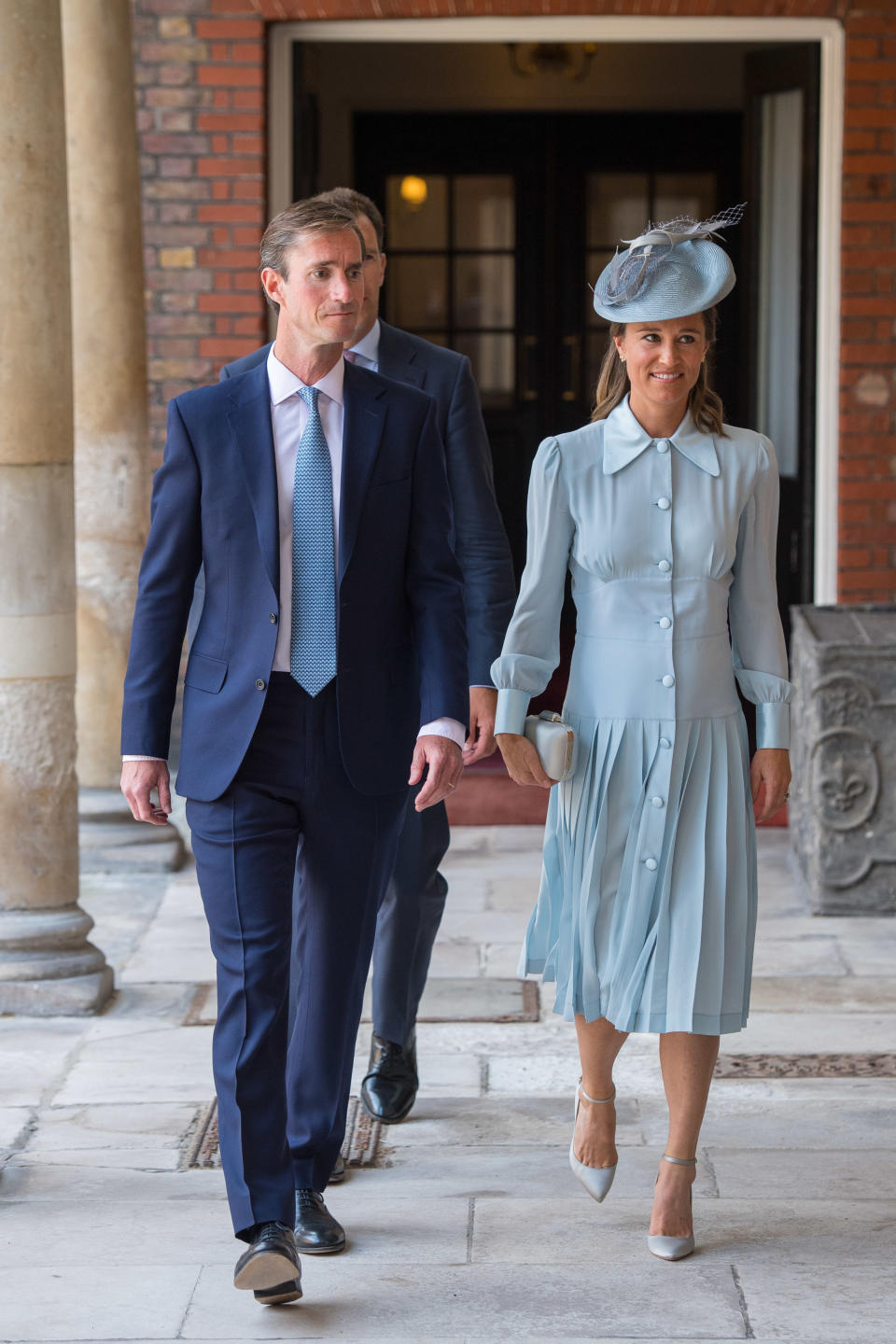 <p>For her nephew’s royal christening on 9 July 2018, Pippa Middleton chose a powder blue dress by Alessandra Rich. She accessorised the look with a co-ordinating hat by Jane Taylor and Jimmy Choo shoes. <em>[Photo: PA]</em> </p>